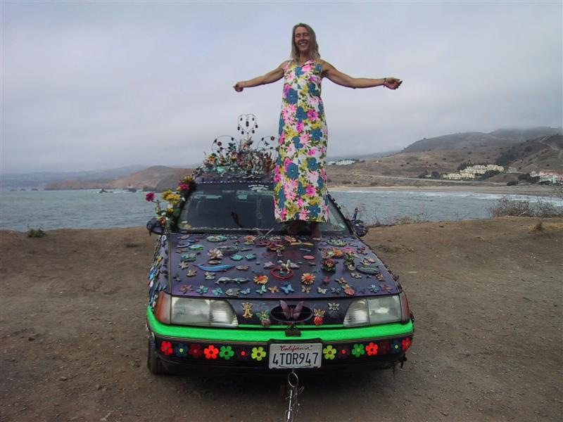 Illustration for article titled Groovalicious Purple Princess Of Peace Art Car Falls On Hard Times, Faces Crusher